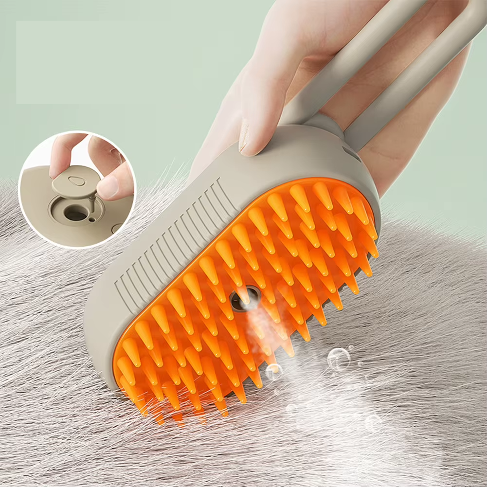 orange electric grooming brush