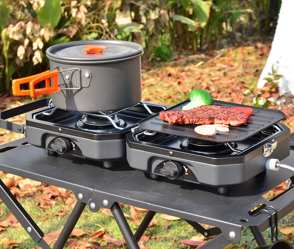Coocking with double outdoor stove