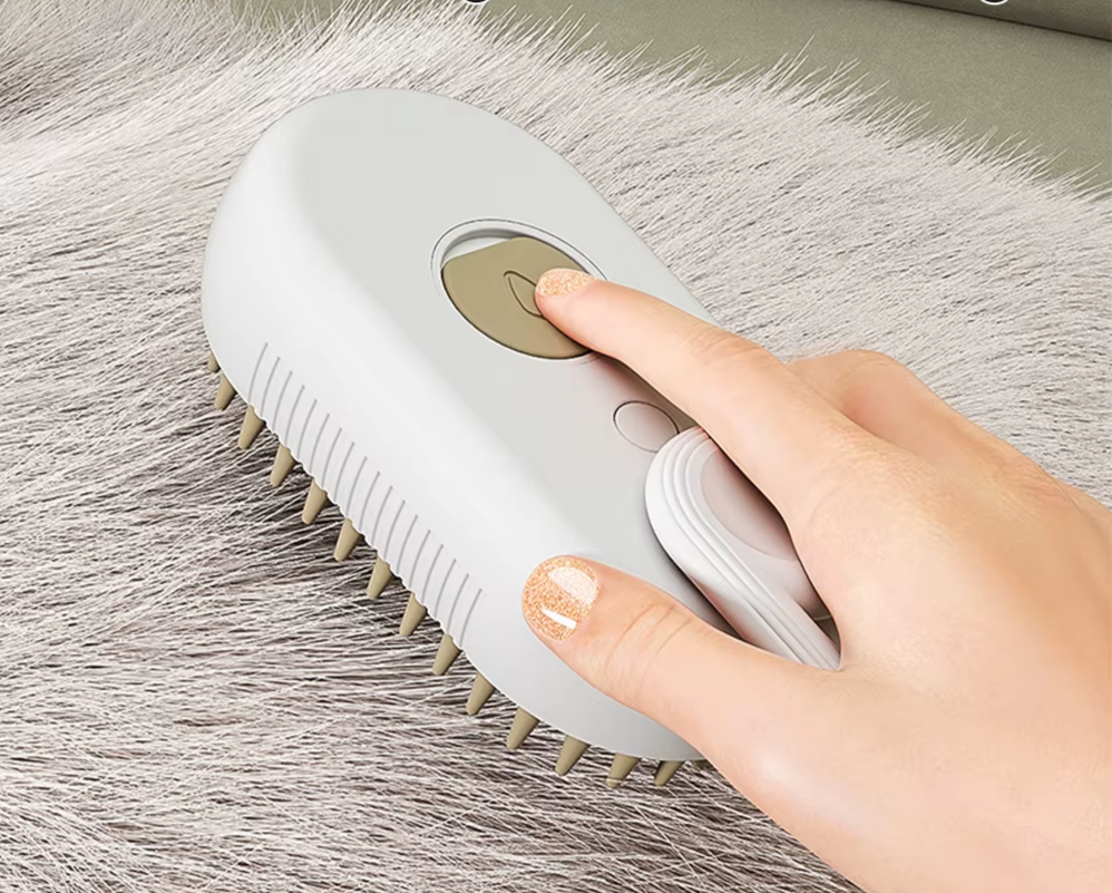 white electric grooming brush