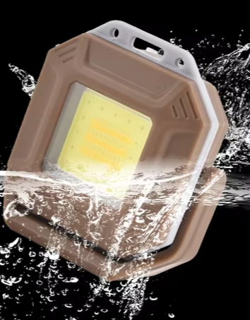 white flashlight floating in water