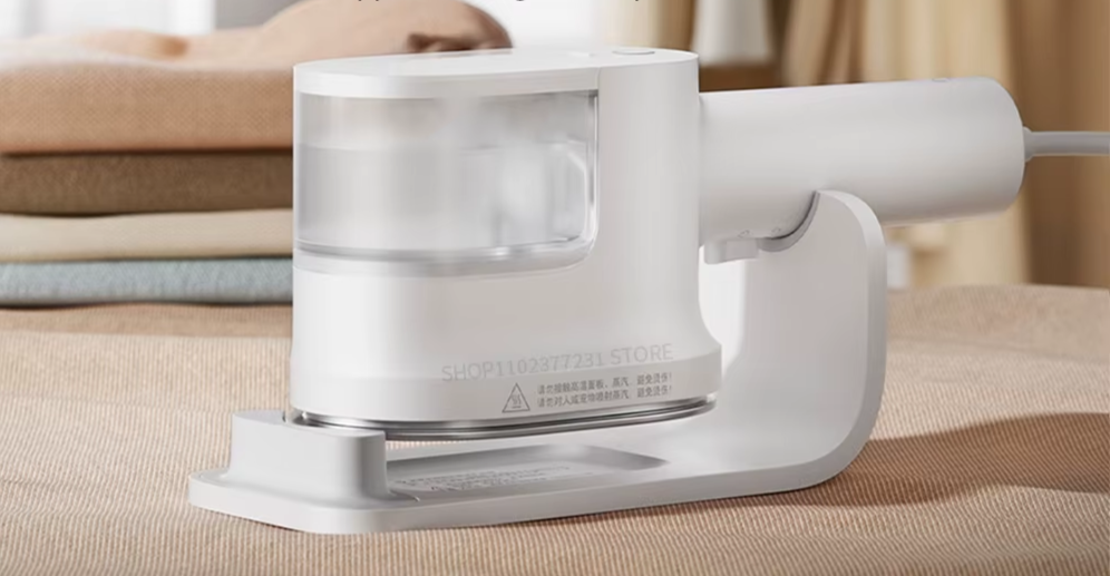 white handheld steam with water container