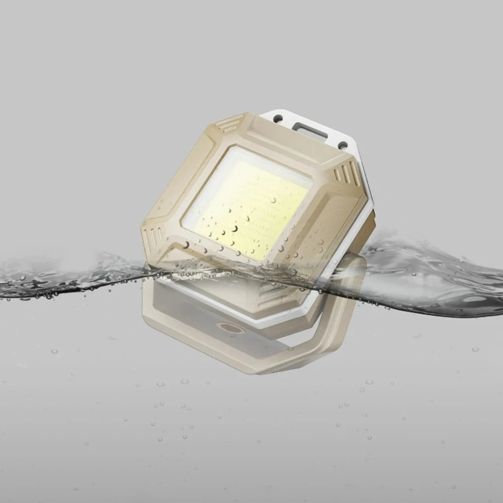 white flashlight floating in water