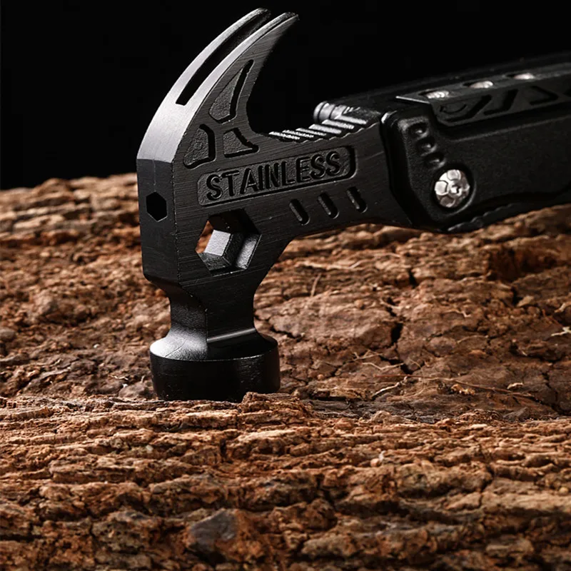multifunctional hammer tool hitting the ground