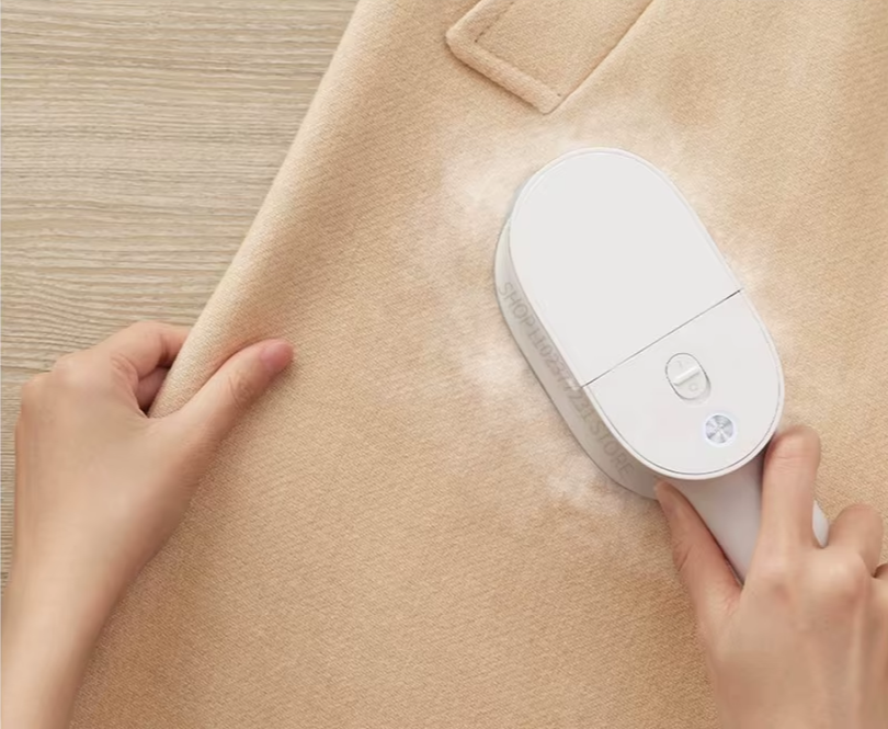 using handheld steam in a piece of cloth