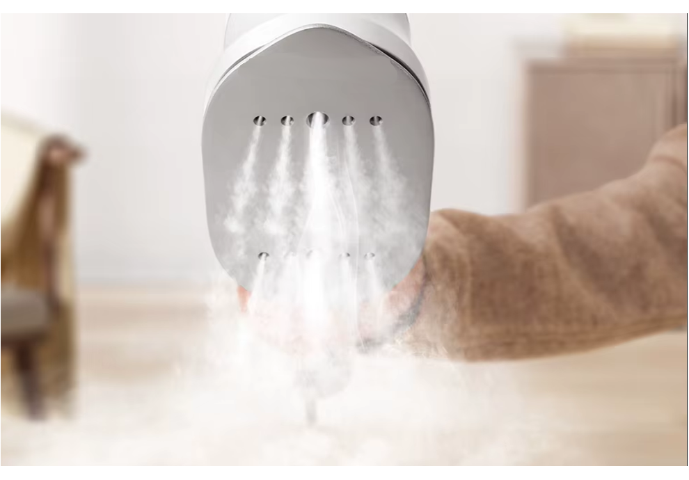 handheld steam spraying hot water